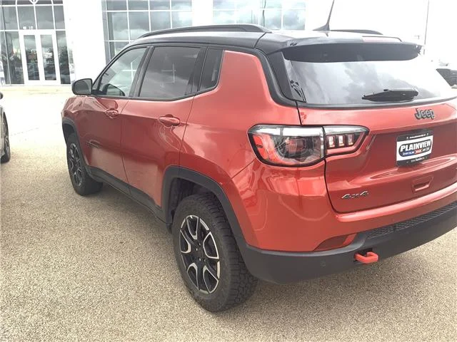 Used 2025 Red Hot Pearlcoat Jeep Trailhawk 4x4 image 6