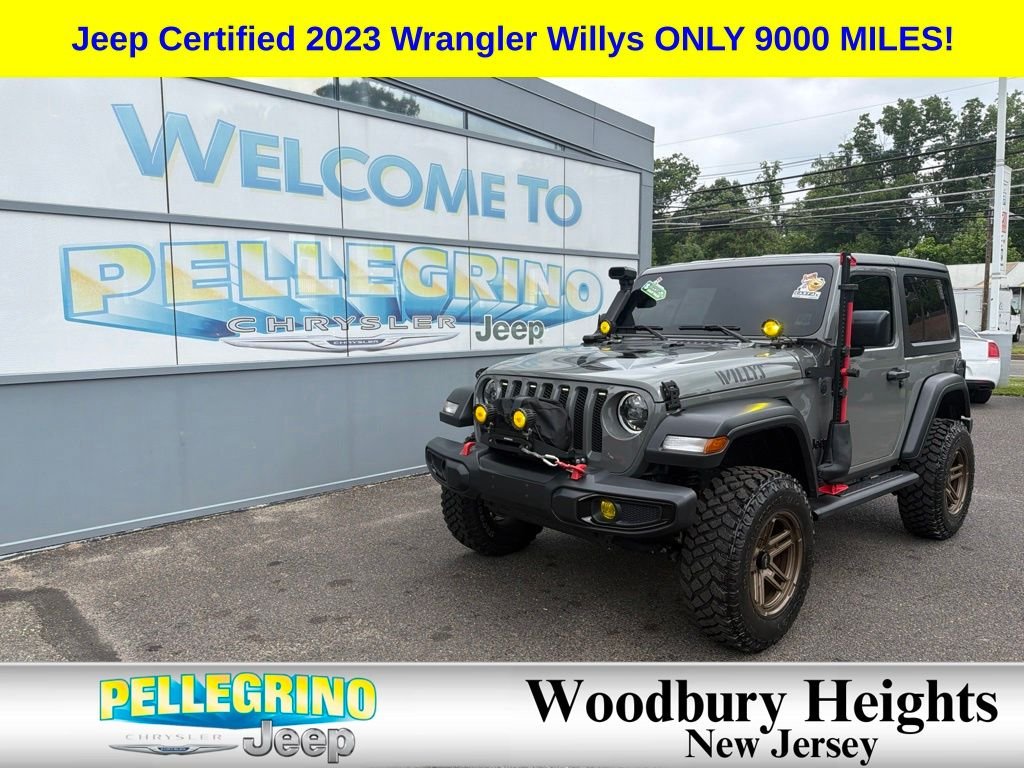 Certified Used 2023 Gray Jeep Sport image 1