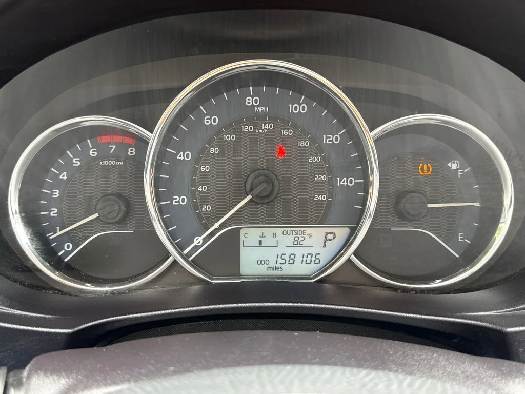 Used 2016 Classic Silver Metallic Toyota LE image 21