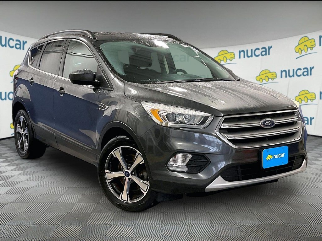 Used 2017 Gray Ford SE image 1
