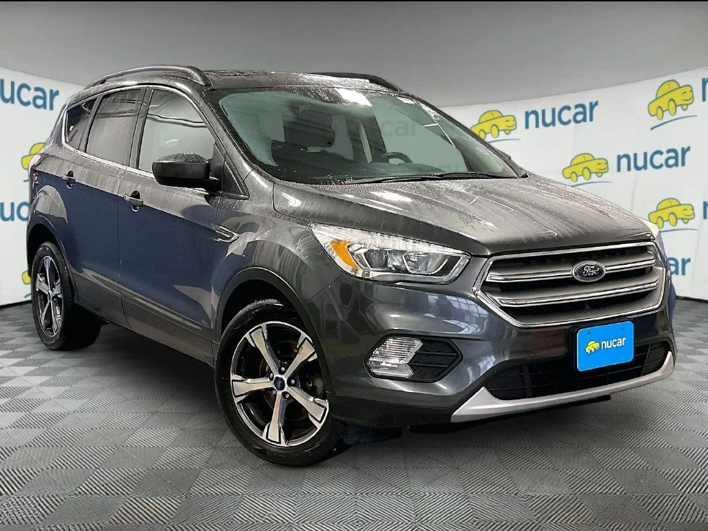 Used 2017 Gray Ford SE image 1