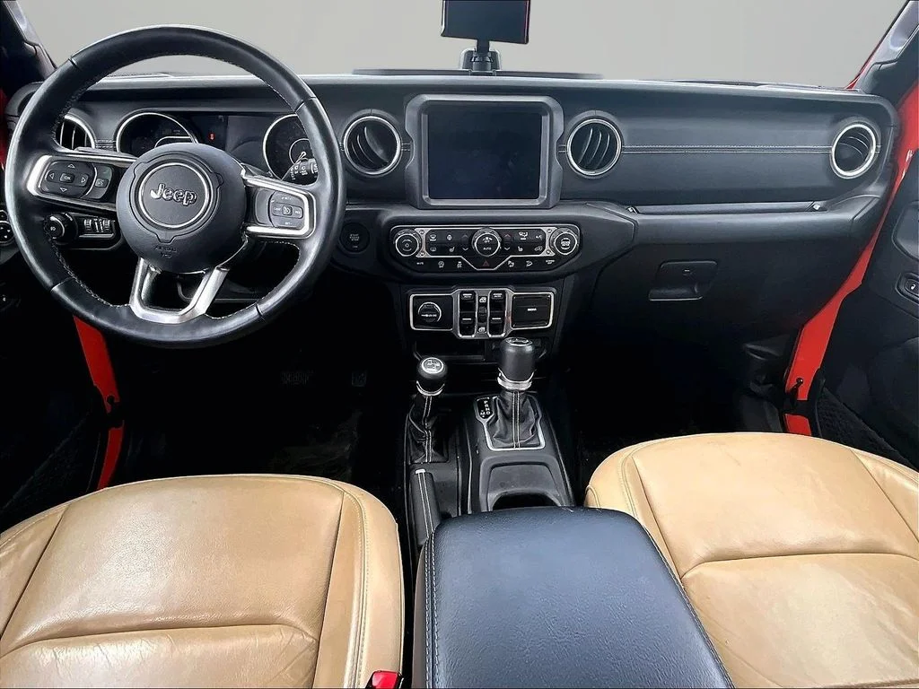 Used 2018 Orange Jeep Unlimited Sahara image 16