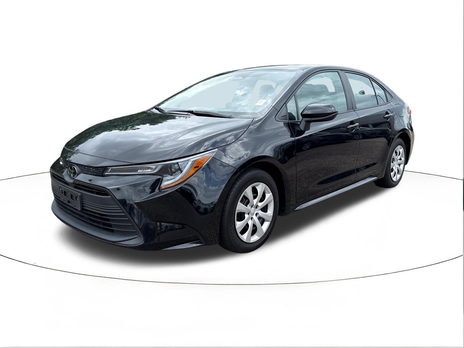 Used 2024 Midnight Black Metallic Toyota LE image 7