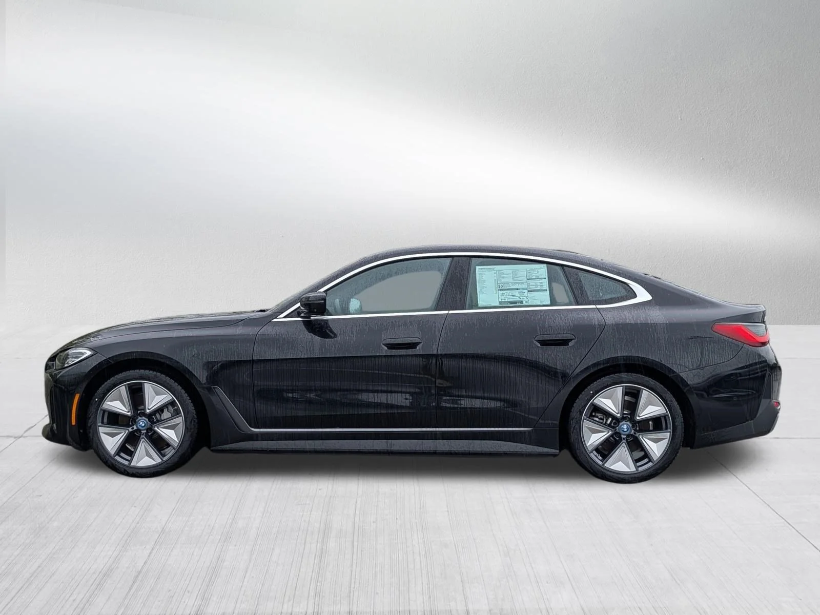 Used 2024 Black Sapphire Metallic BMW eDrive40 image 4