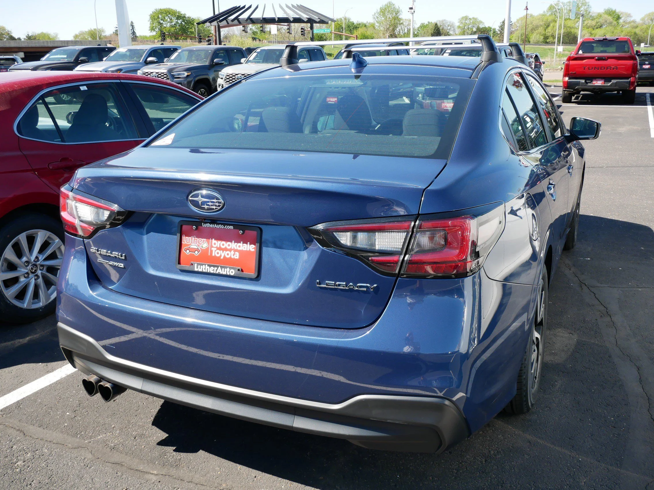 Used 2021 Subaru Legacy Premium with VIN 4S3BWAC67M3015015 for sale in Brooklyn Center, Minnesota