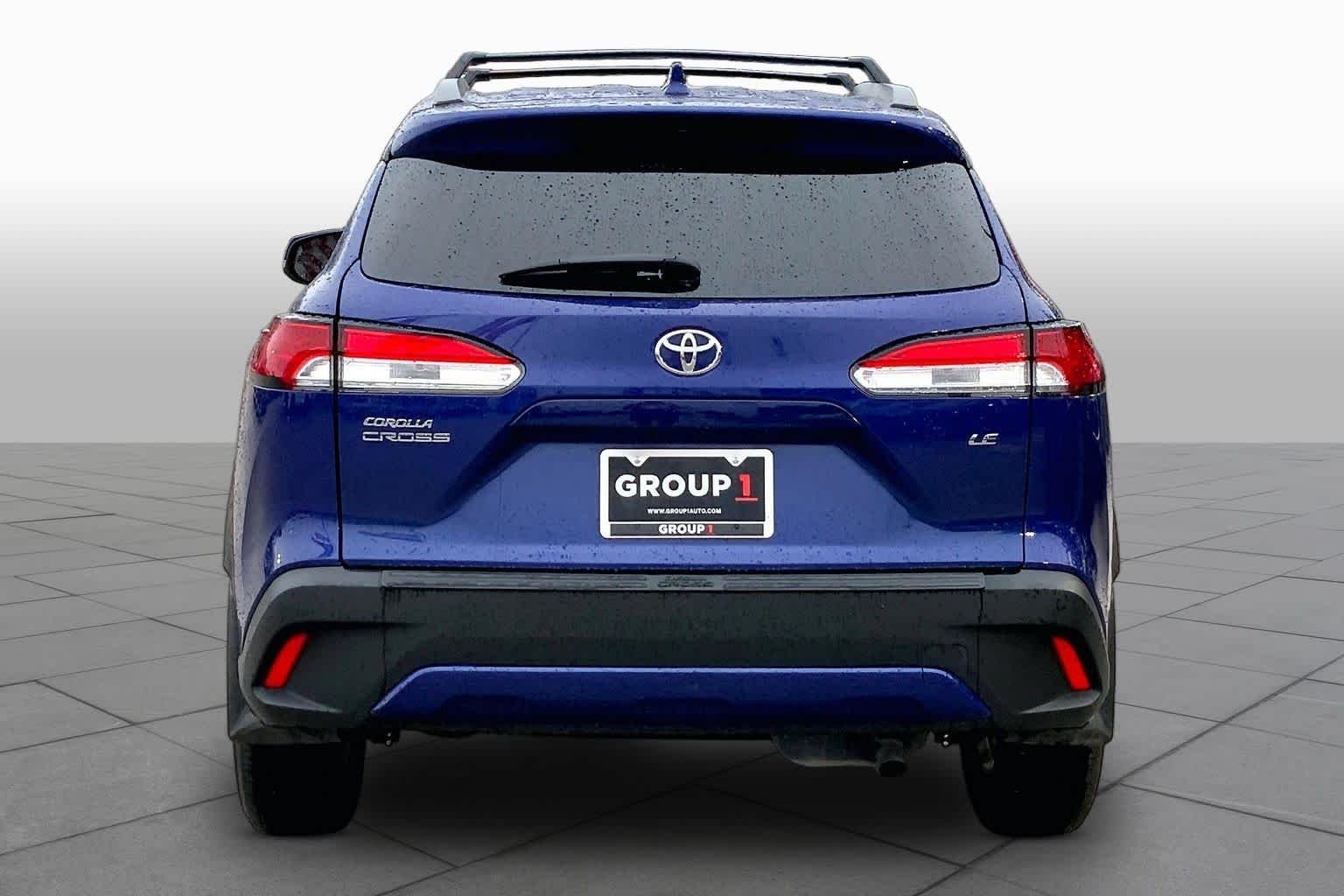 Used 2024 Blue Crush Metallic Toyota LE image 5