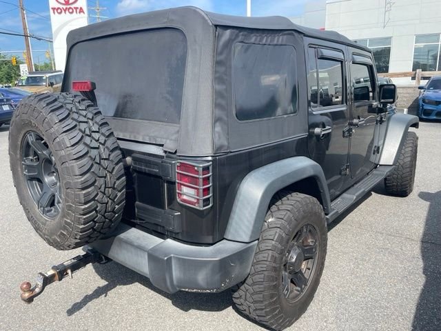 Used 2017 Black Jeep Unlimited Sport image 2
