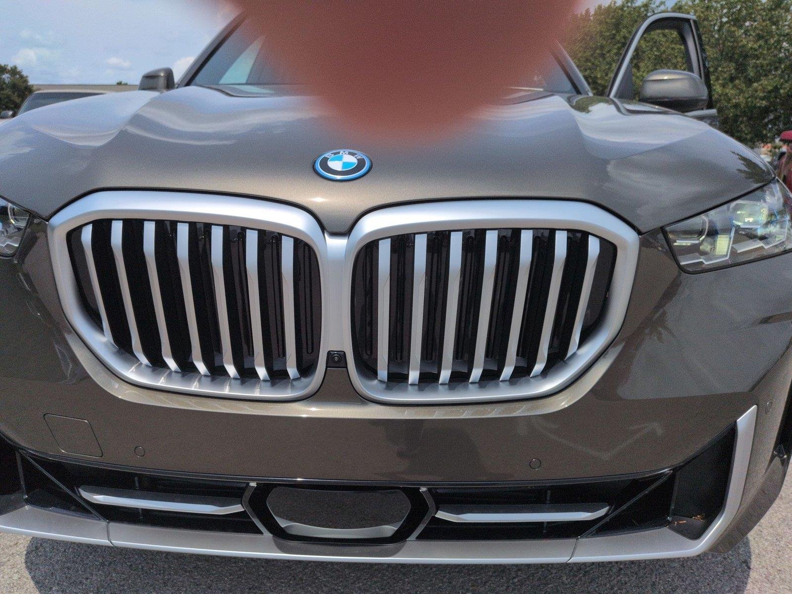 New 2026 Manhattan Green Metallic BMW xDrive50e image 14