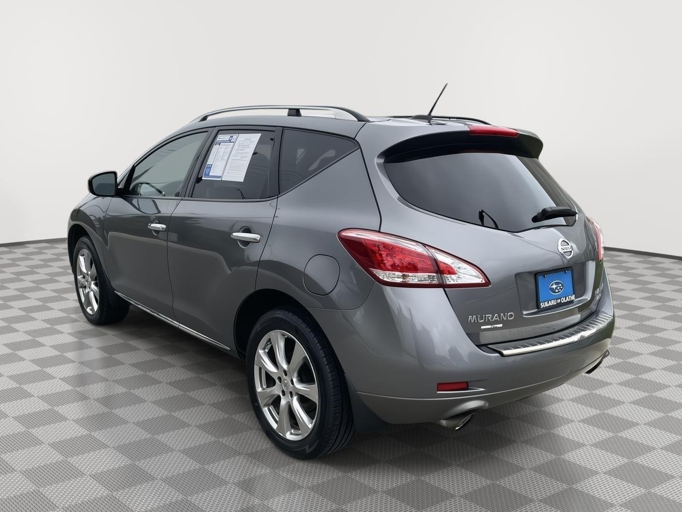 Used 2013 Gun Metallic Nissan LE image 13