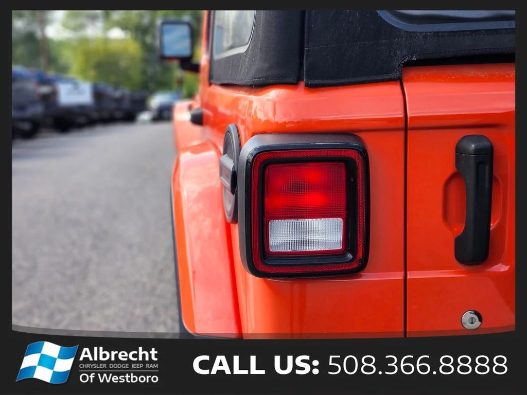 Used 2020 Orange Jeep Unlimited Sahara image 9