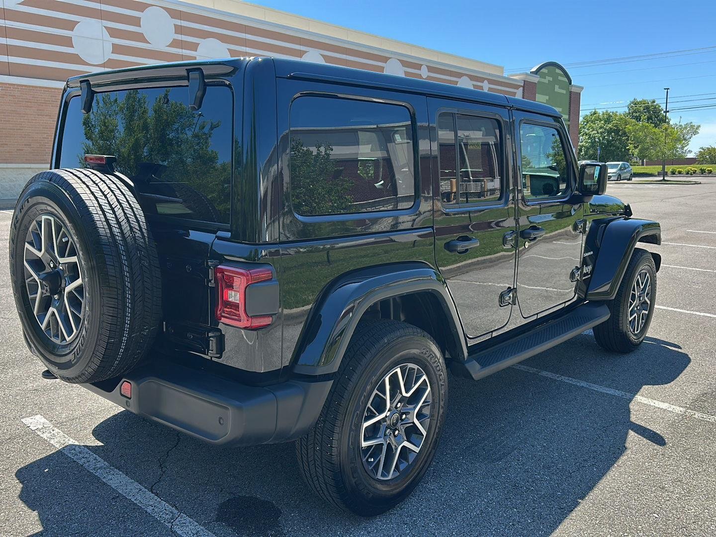 Used 2024 Black Clearcoat Jeep Sahara image 5
