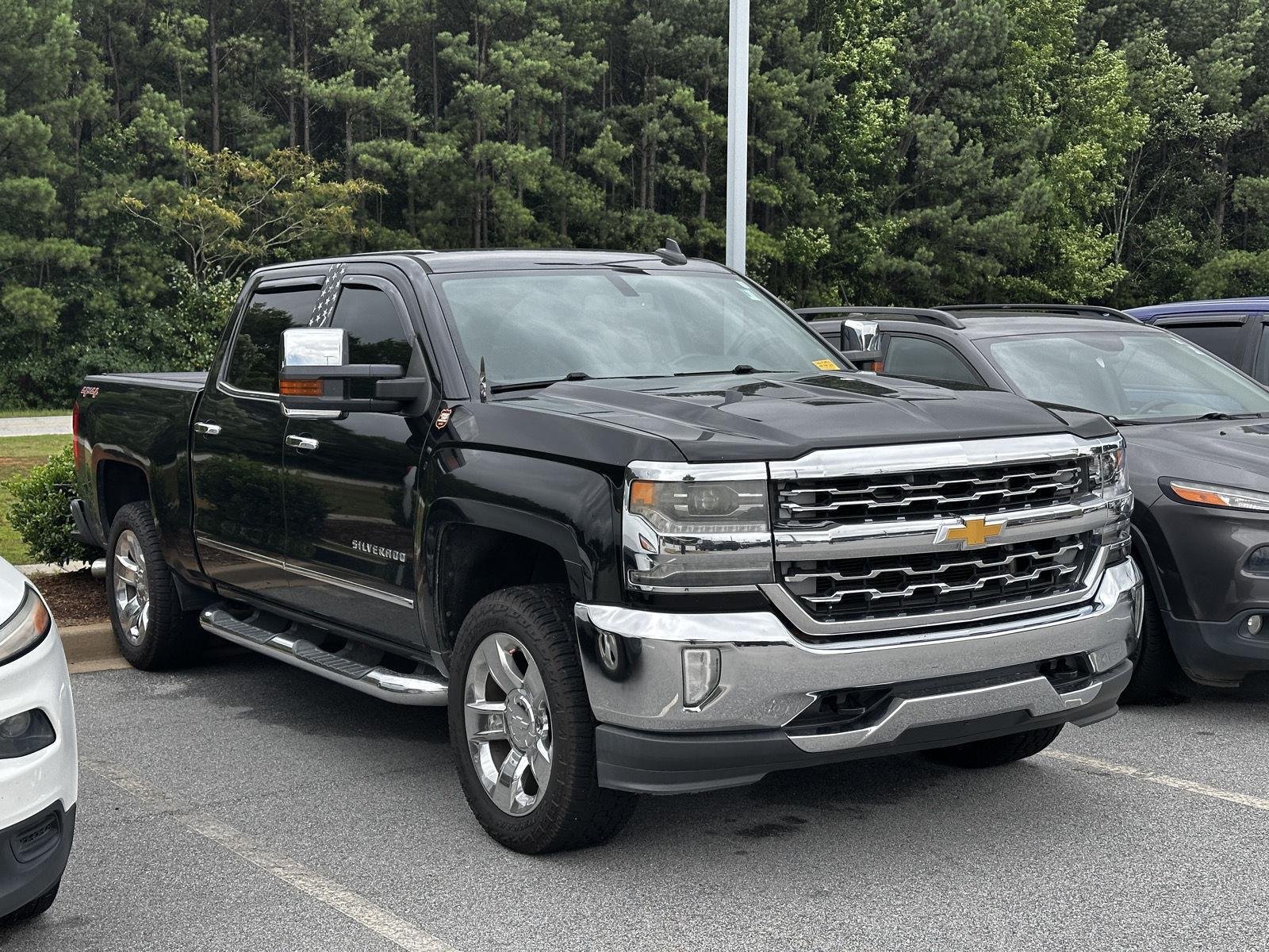 Used 2016 Black Chevrolet LTZ image 1