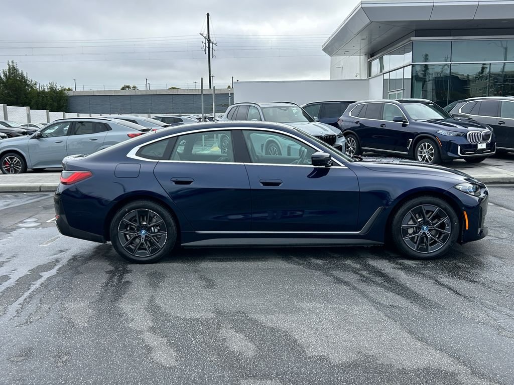 Certified Used 2023 Tanzanite Blue II Metallic BMW eDrive40 image 6