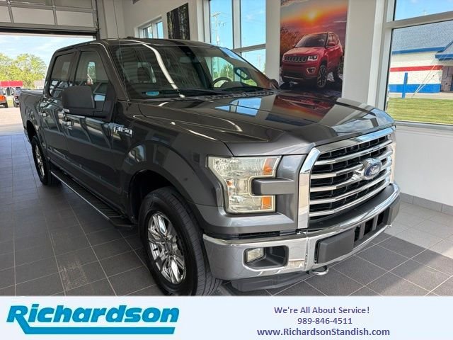 Used 2015 Magnetic Metallic Ford XLT image 1