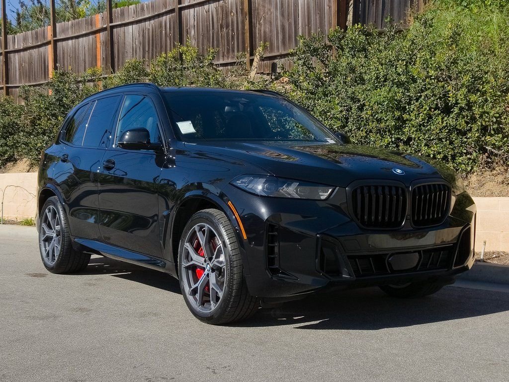 New 2026 Black Sapphire Metallic BMW xDrive50e image 2