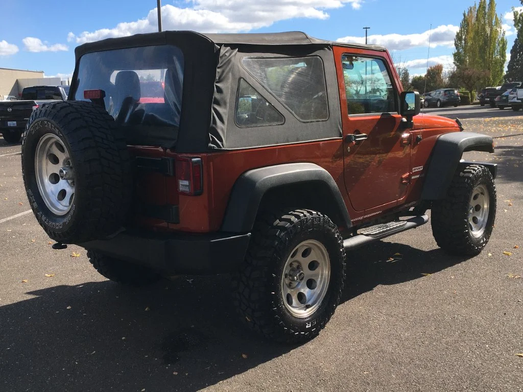 Used 2014 Orange Jeep Sport image 6