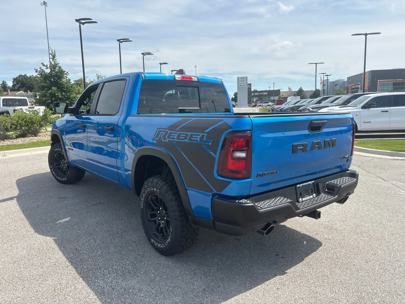 New 2026 Hydro Blue Pearl-Coat Exterior Paint RAM Rebel image 7