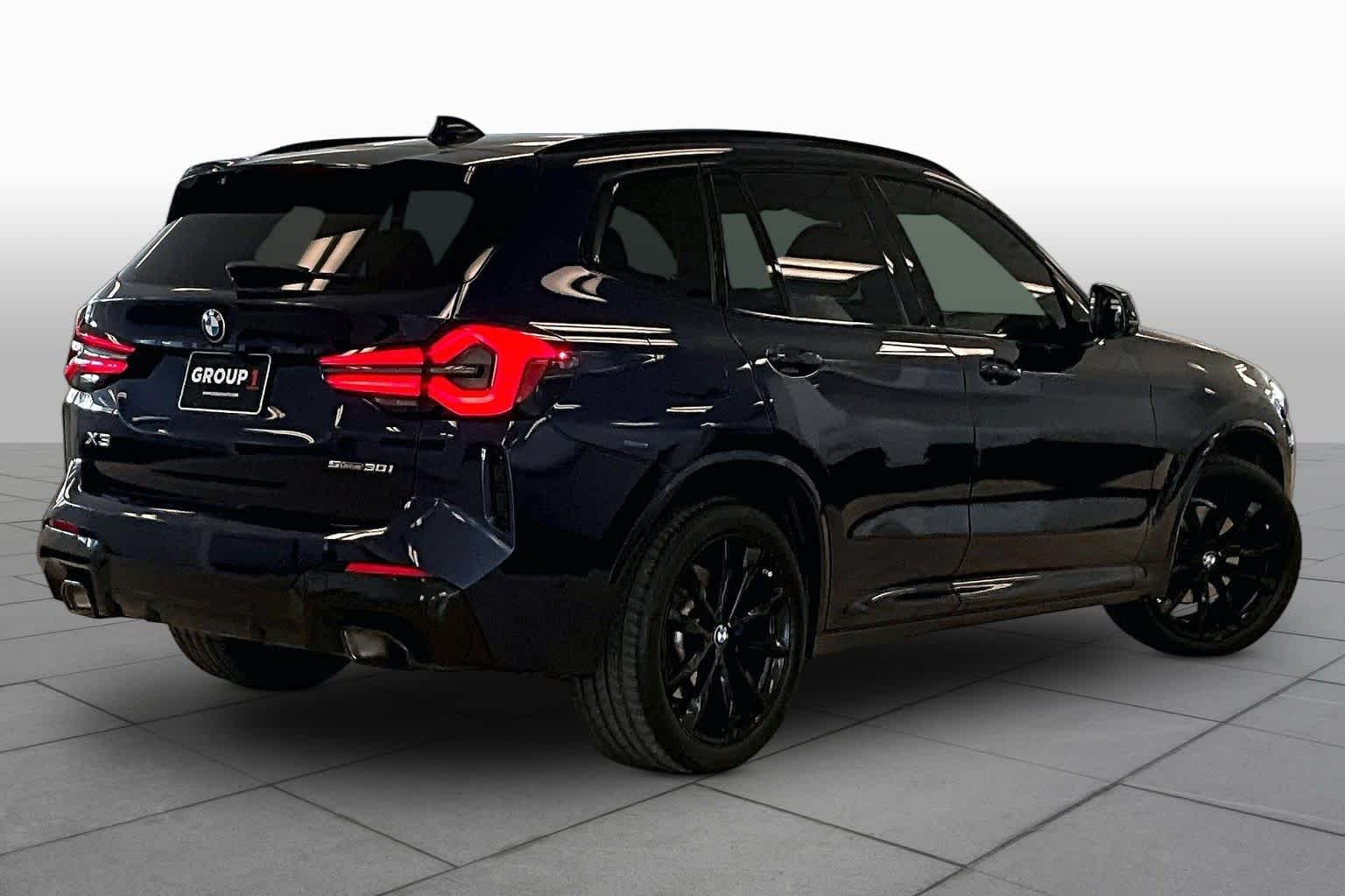 Used 2024 Tanzanite Blue II Metallic BMW sDrive30i image 12