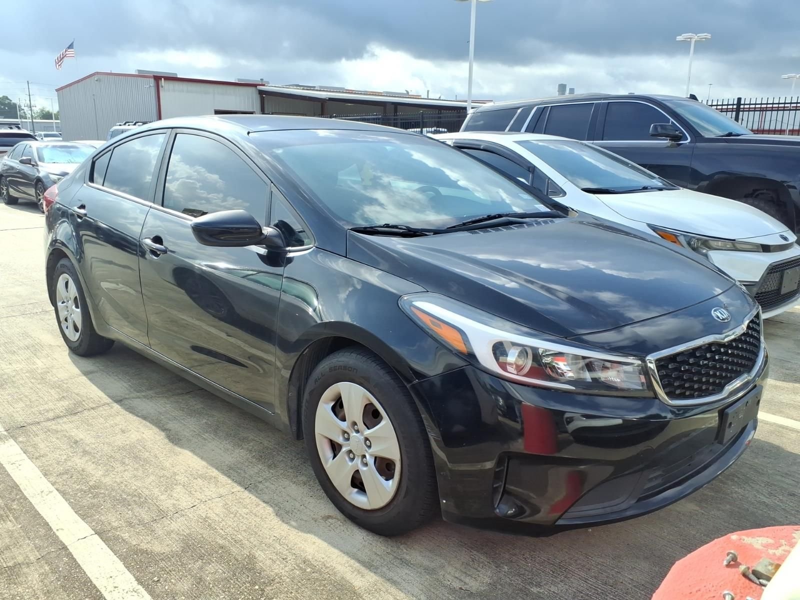 Used 2017 Aurora Black Kia LX image 1