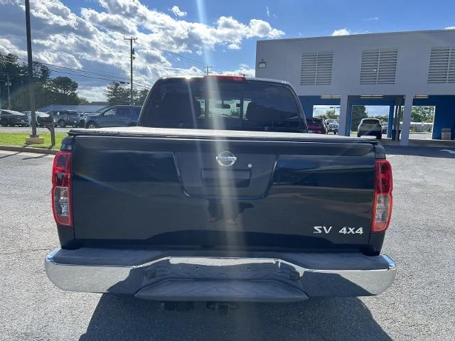 Used 2019 Magnetic Black Nissan  image 4