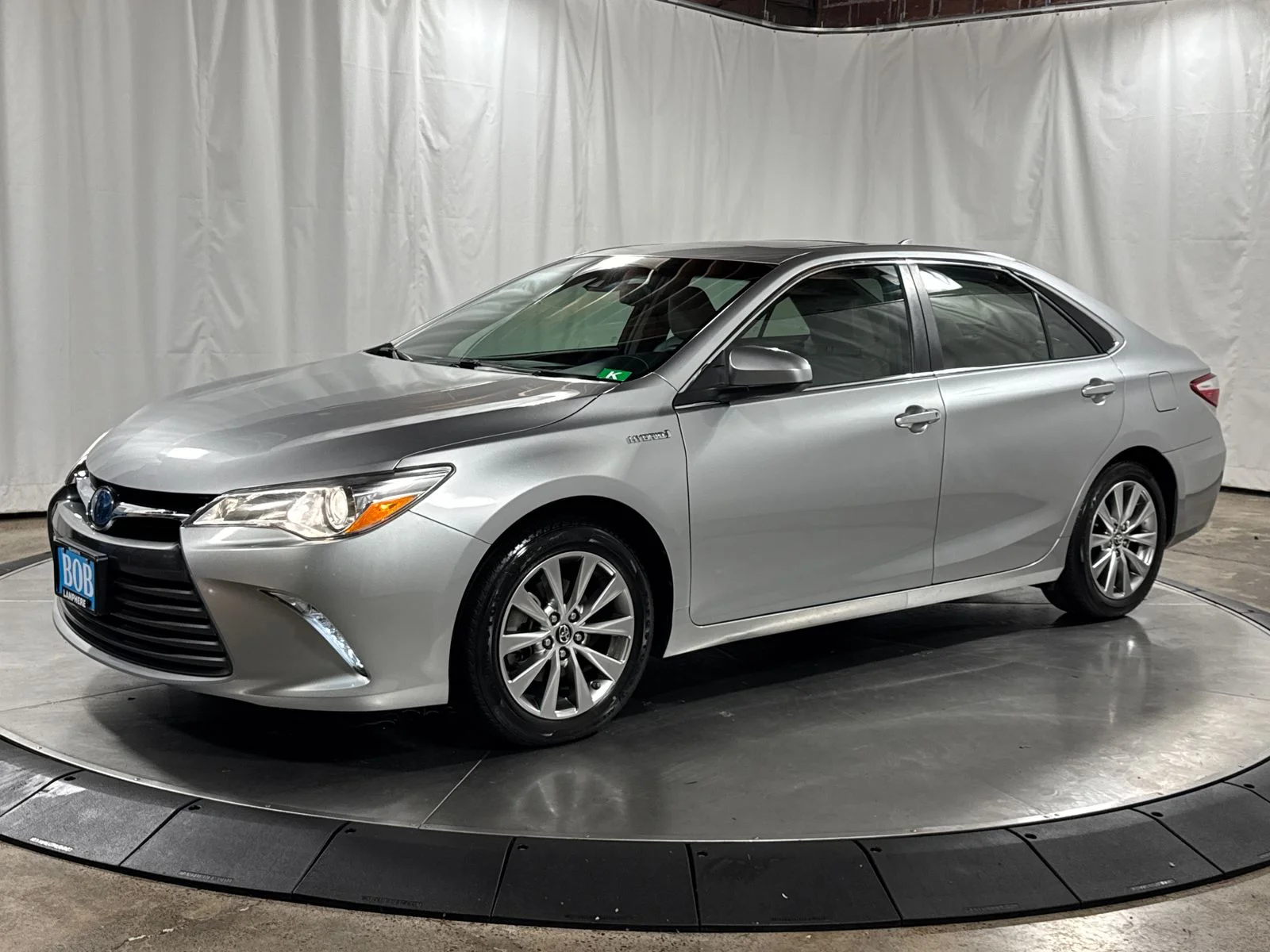 Used 2016 Celestial Silver Metallic Toyota XLE image 1