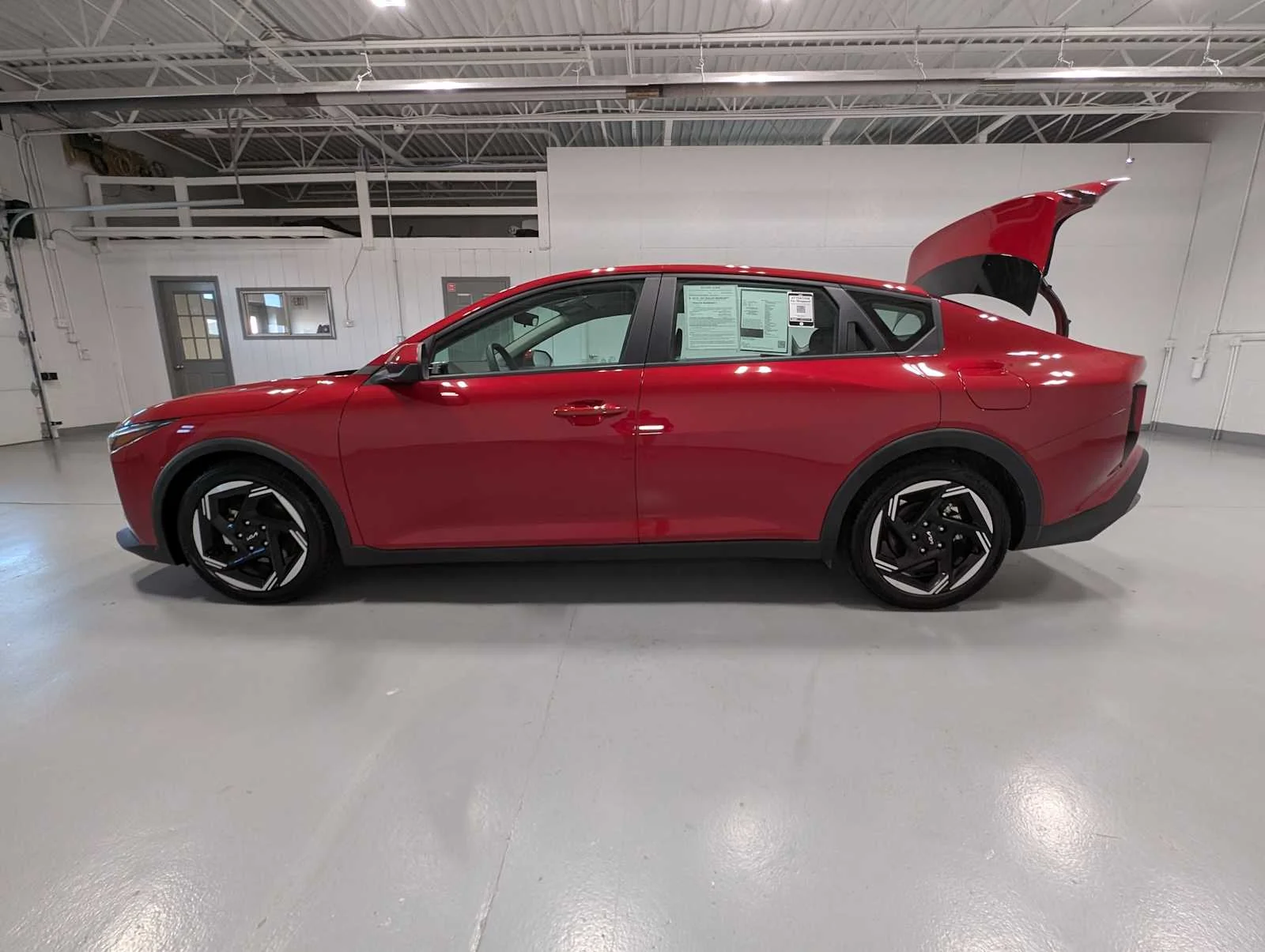 Used 2025 Currant Red Kia EX image 12