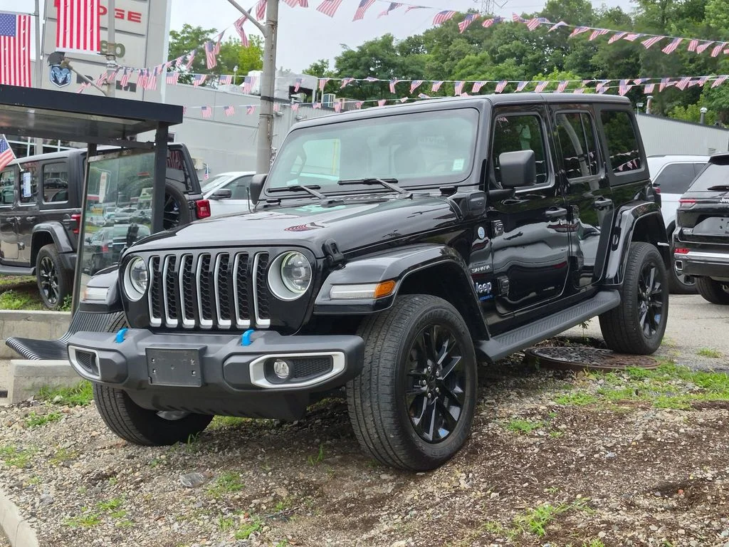 Used 2023 Black Jeep Sahara 4xe image 1