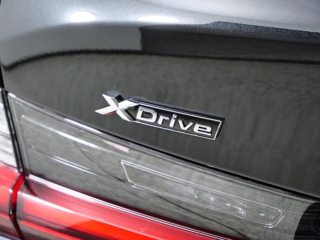 Used 2026 Black Sapphire Metallic BMW 330i xDrive image 14