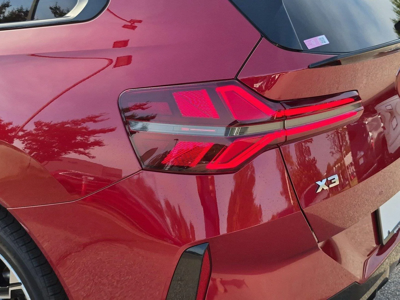 Used 2025 Vegas Red Metallic BMW M50 xDrive image 11