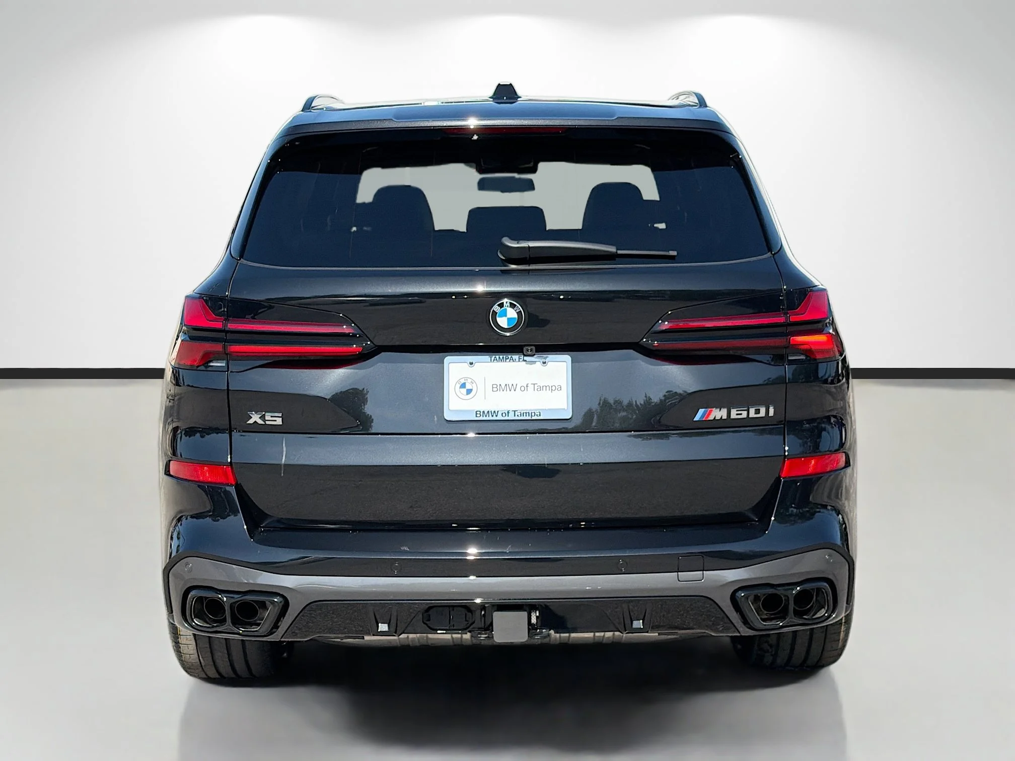 New 2026 Black Sapphire Metallic BMW M60i image 4