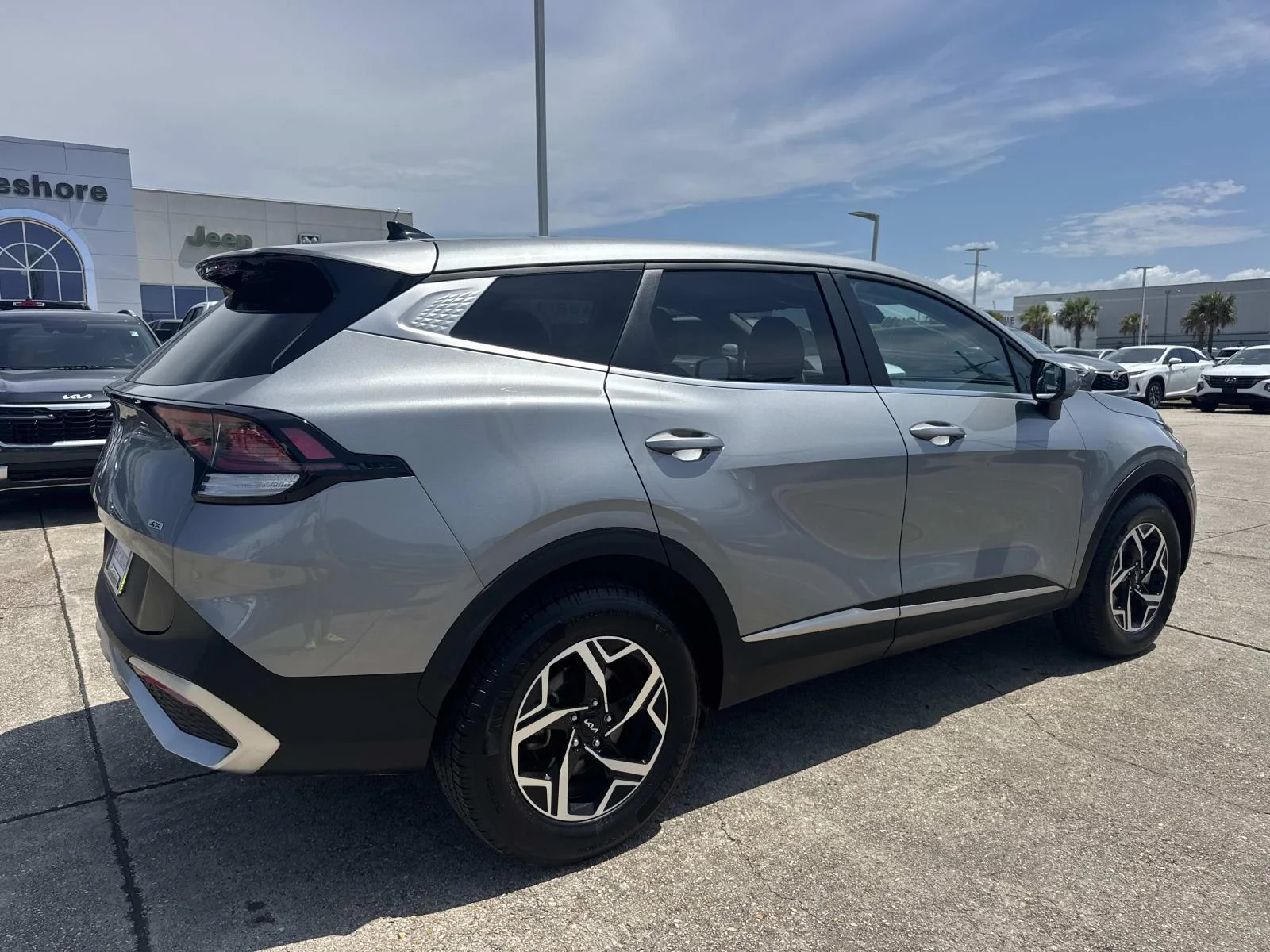 Certified Used 2023 Gray Kia LX AWD image 7