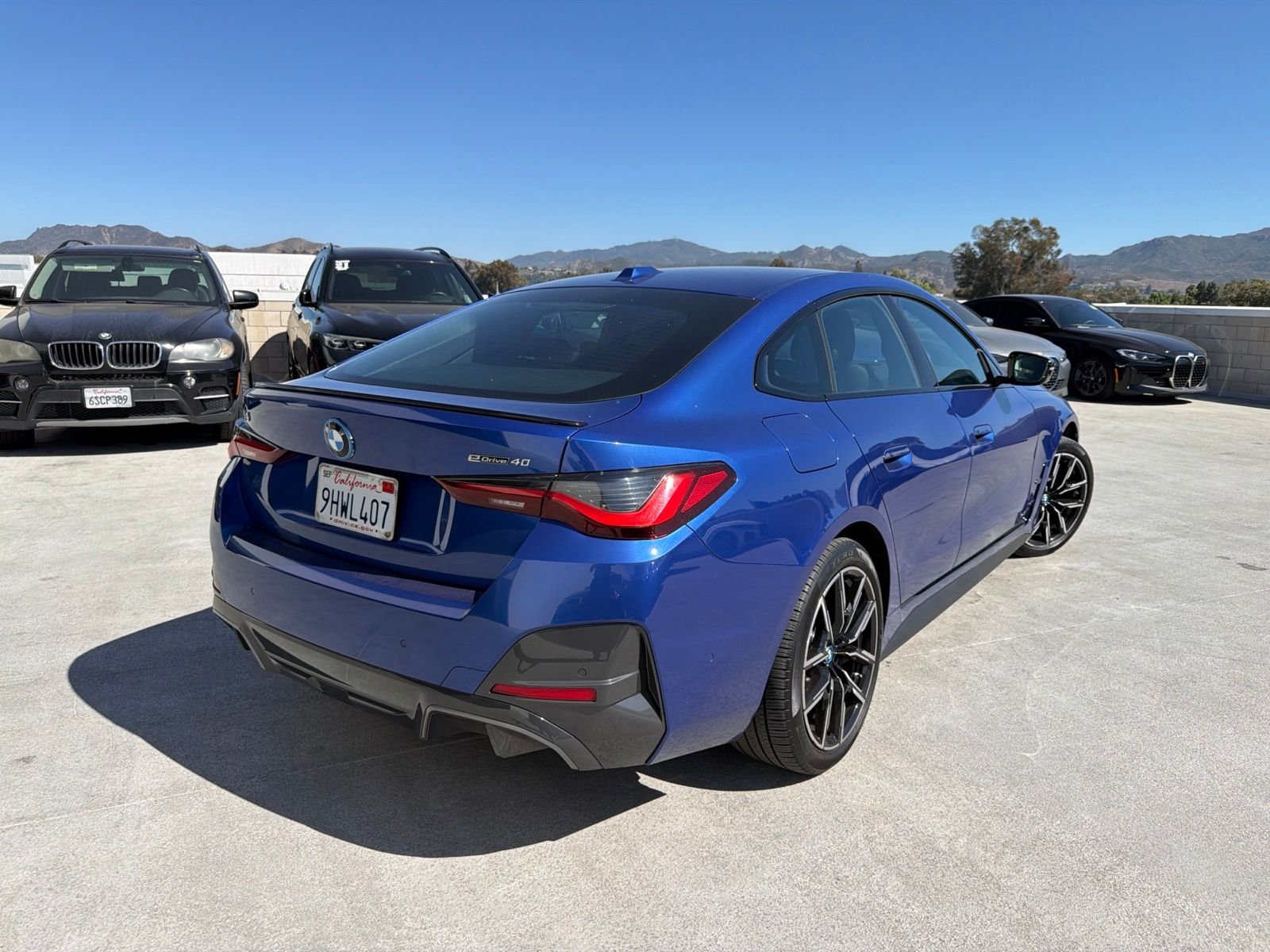 Certified Used 2023 Portimao Blue Metallic BMW eDrive40 image 4