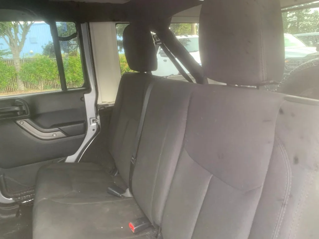 Used 2018 Billet Silver Metallic Clearcoat Jeep Unlimited Sport image 19
