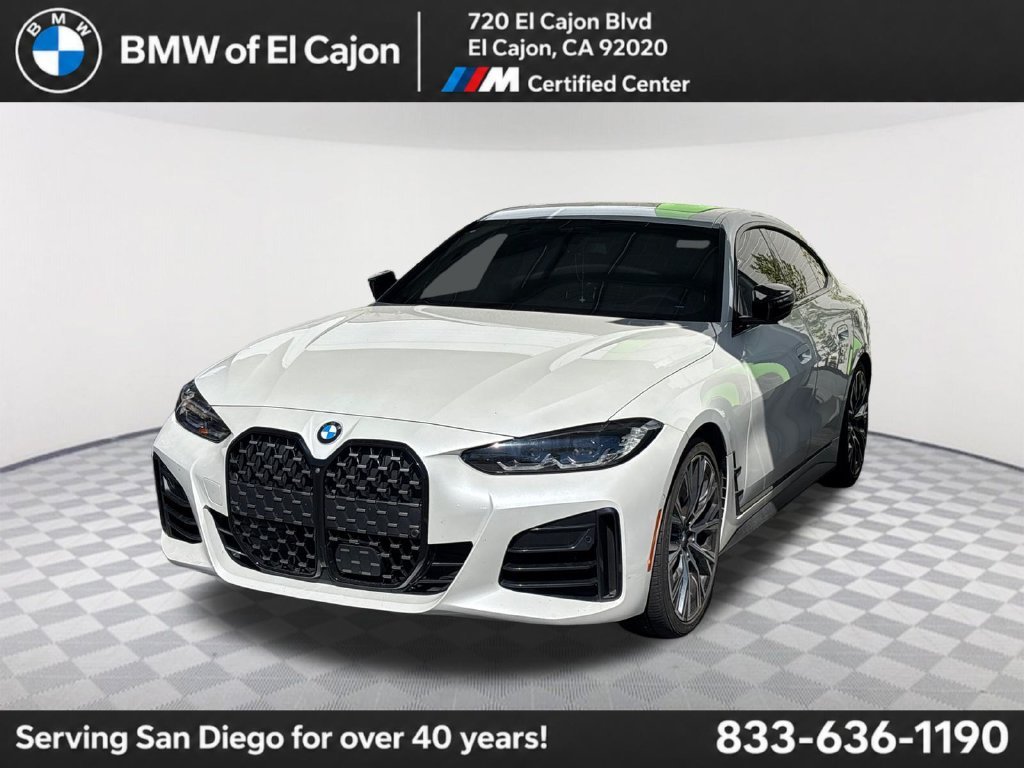 Used 2024 Mineral White Metallic BMW M440i image 1