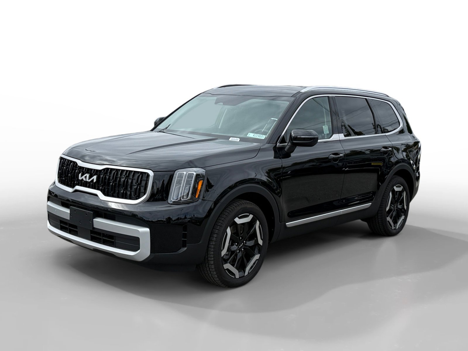 New 2025 Ebony Black Kia EX image 1