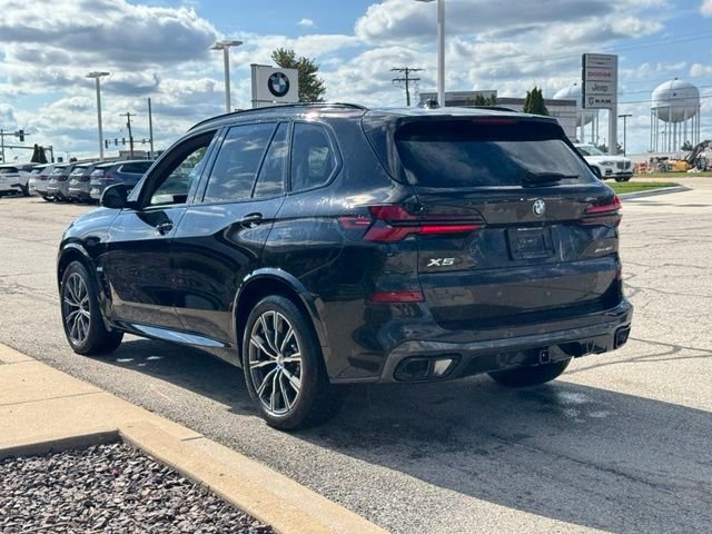 Certified Used 2024 Black Sapphire Metallic BMW xDrive40i image 4