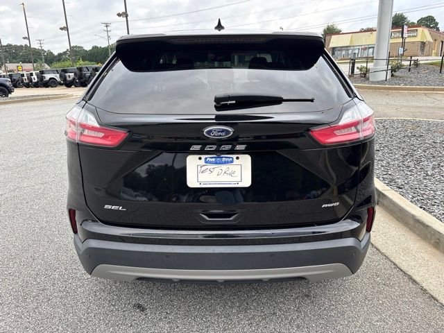 Certified Used 2022 Agate Black Metallic Ford SEL image 7