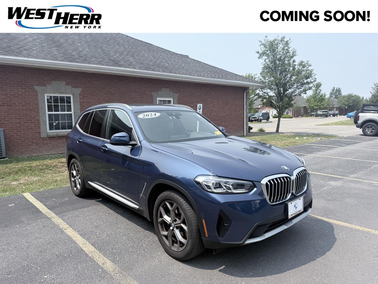 Used 2024 Phytonic Blue Metallic BMW xDrive30i image 1