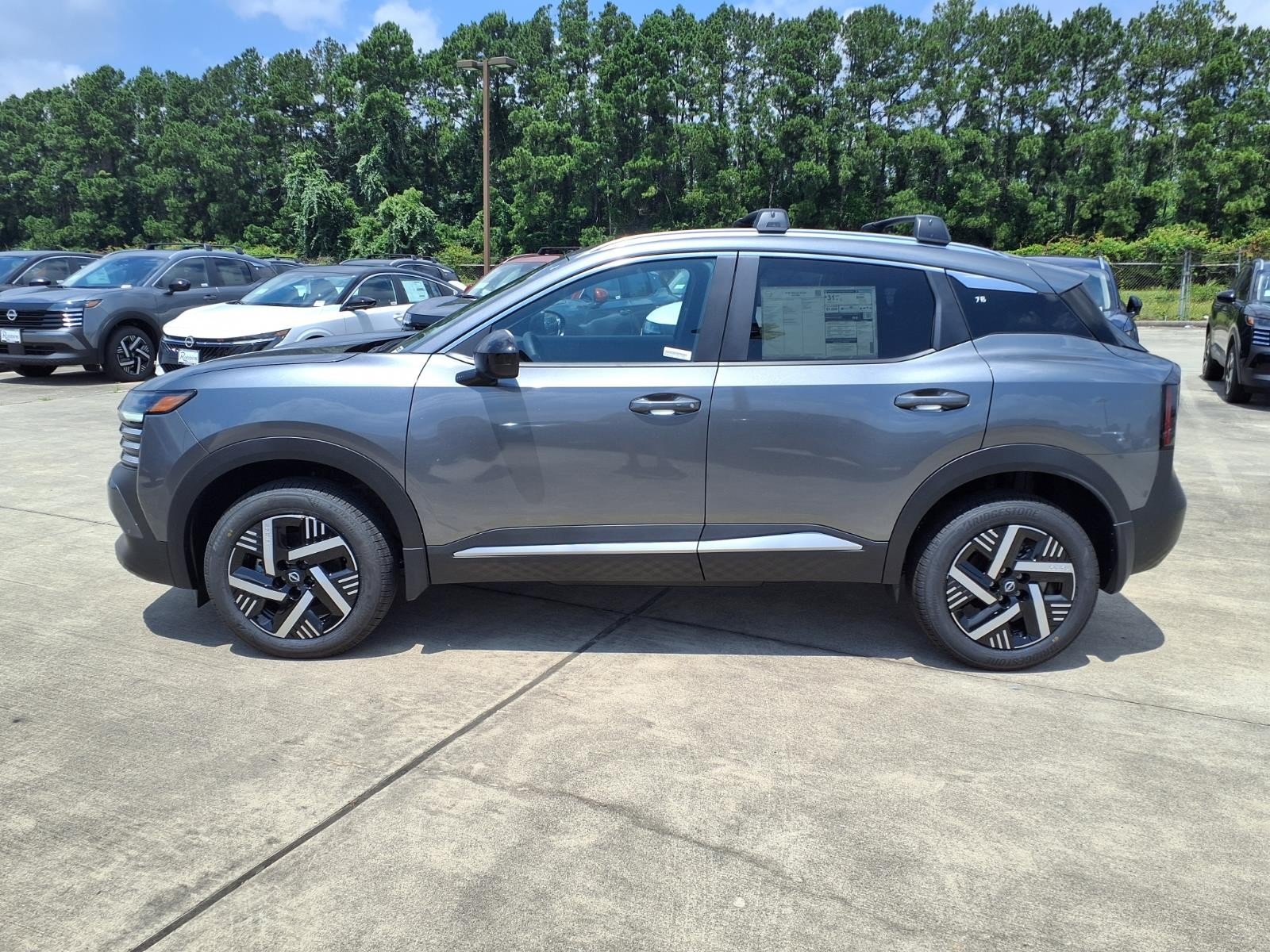 New 2026 Gun Metallic Nissan SV image 7