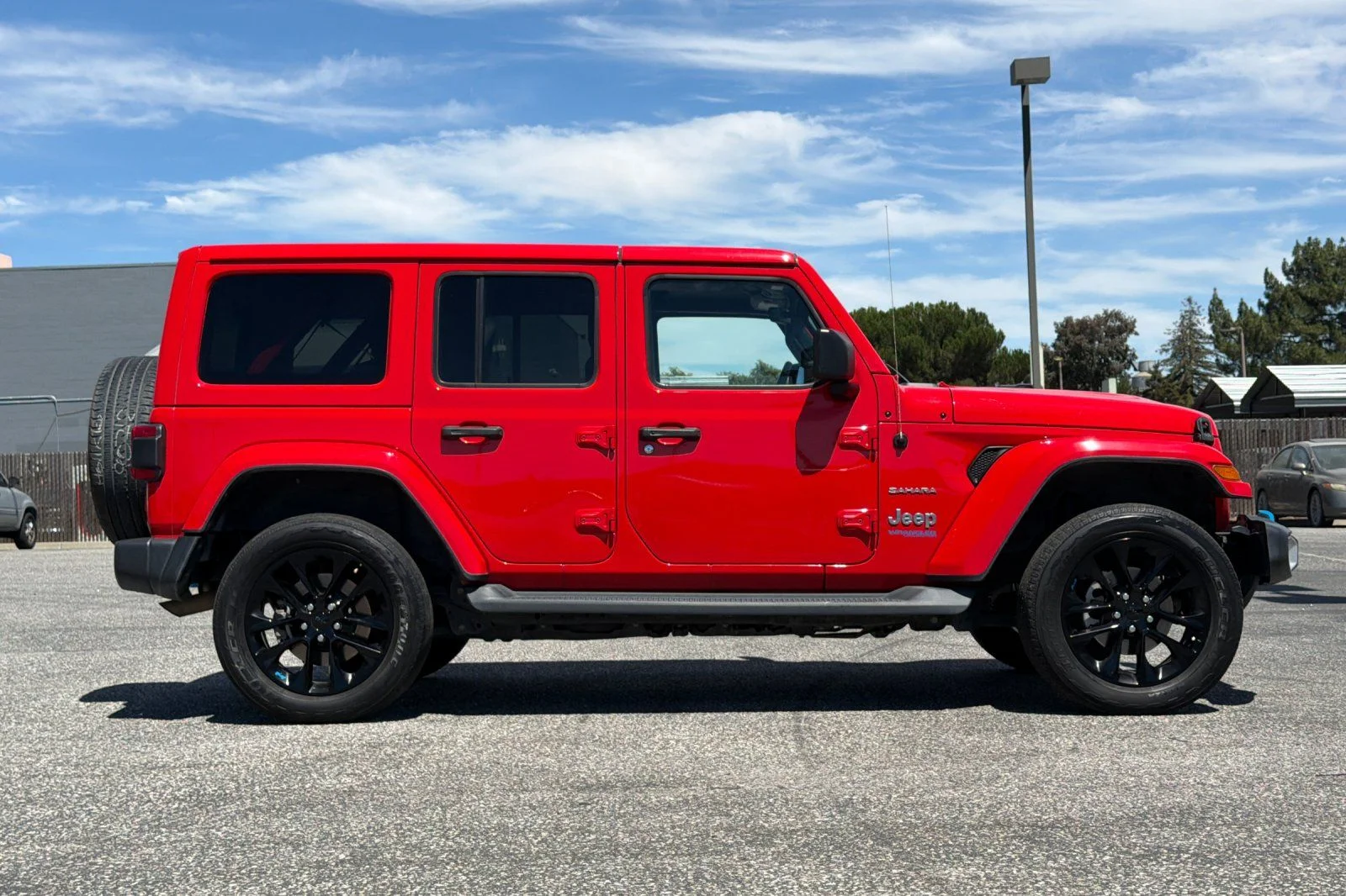 Used 2022 Red Jeep Unlimited Sahara 4xe image 3