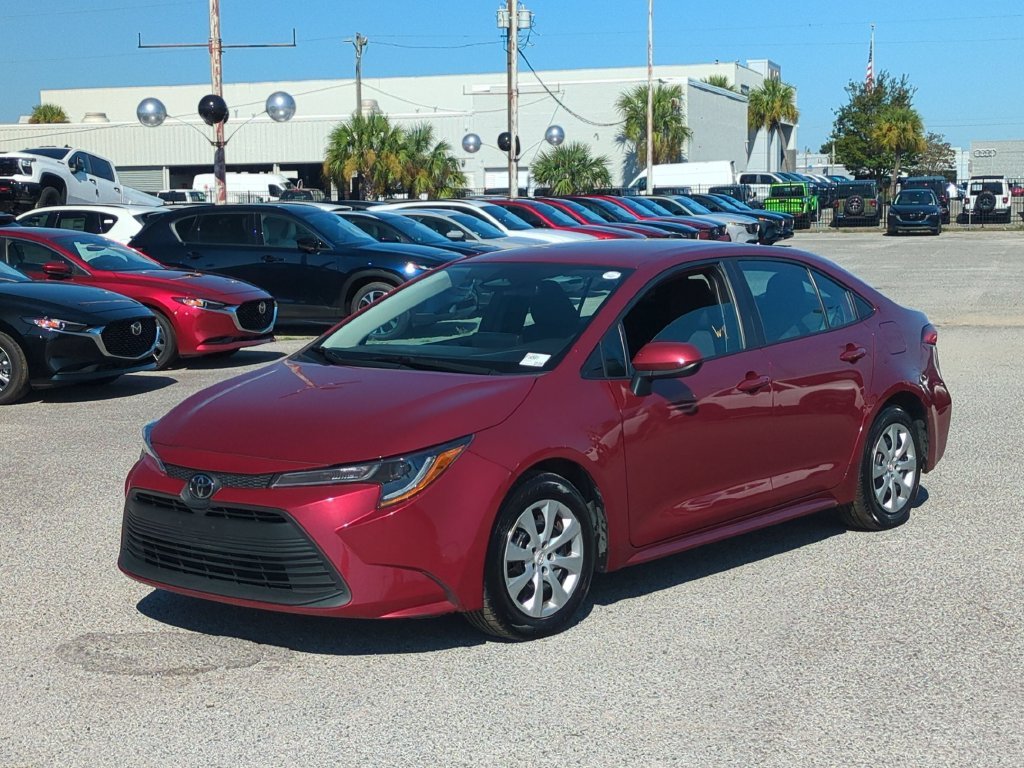 Used 2025 Red Toyota LE image 1
