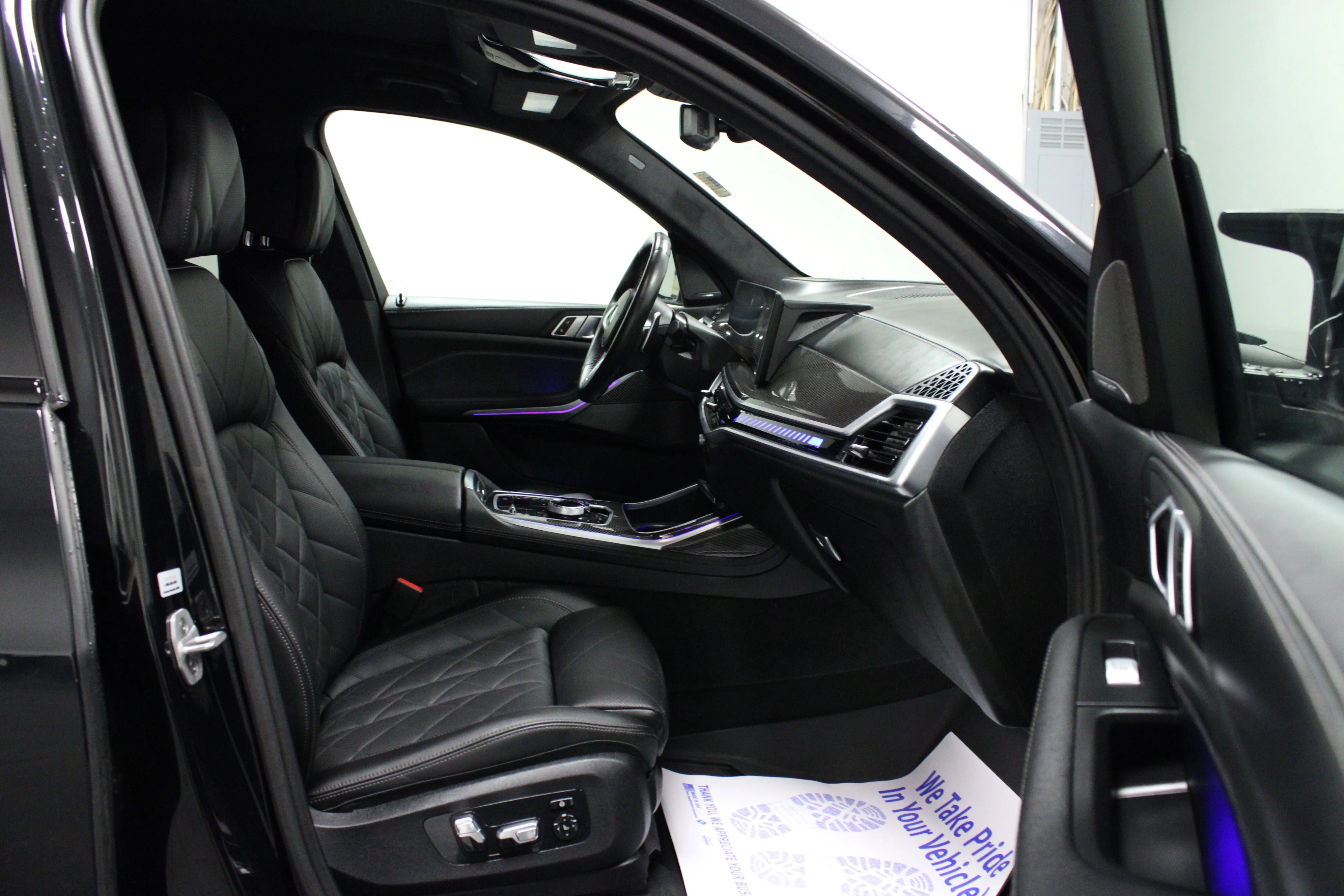 Used 2024 Black Sapphire Metallic BMW M60i image 16