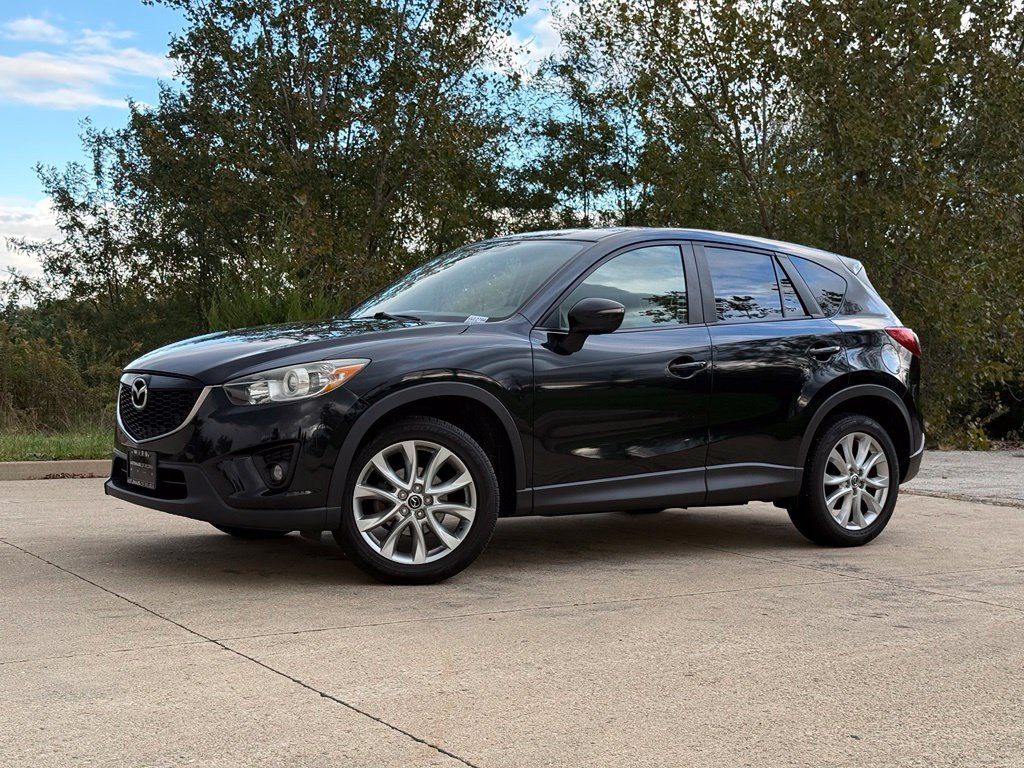 Used 2015 Black Mazda Grand Touring image 1