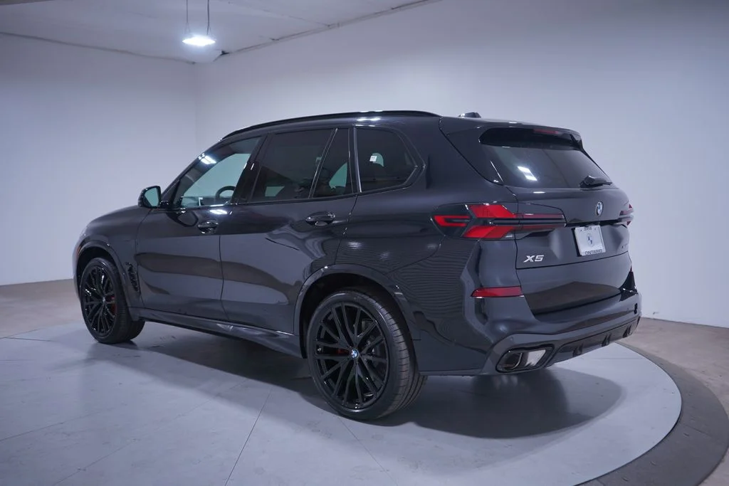 Used 2026 Black Sapphire Metallic BMW sDrive40i image 3
