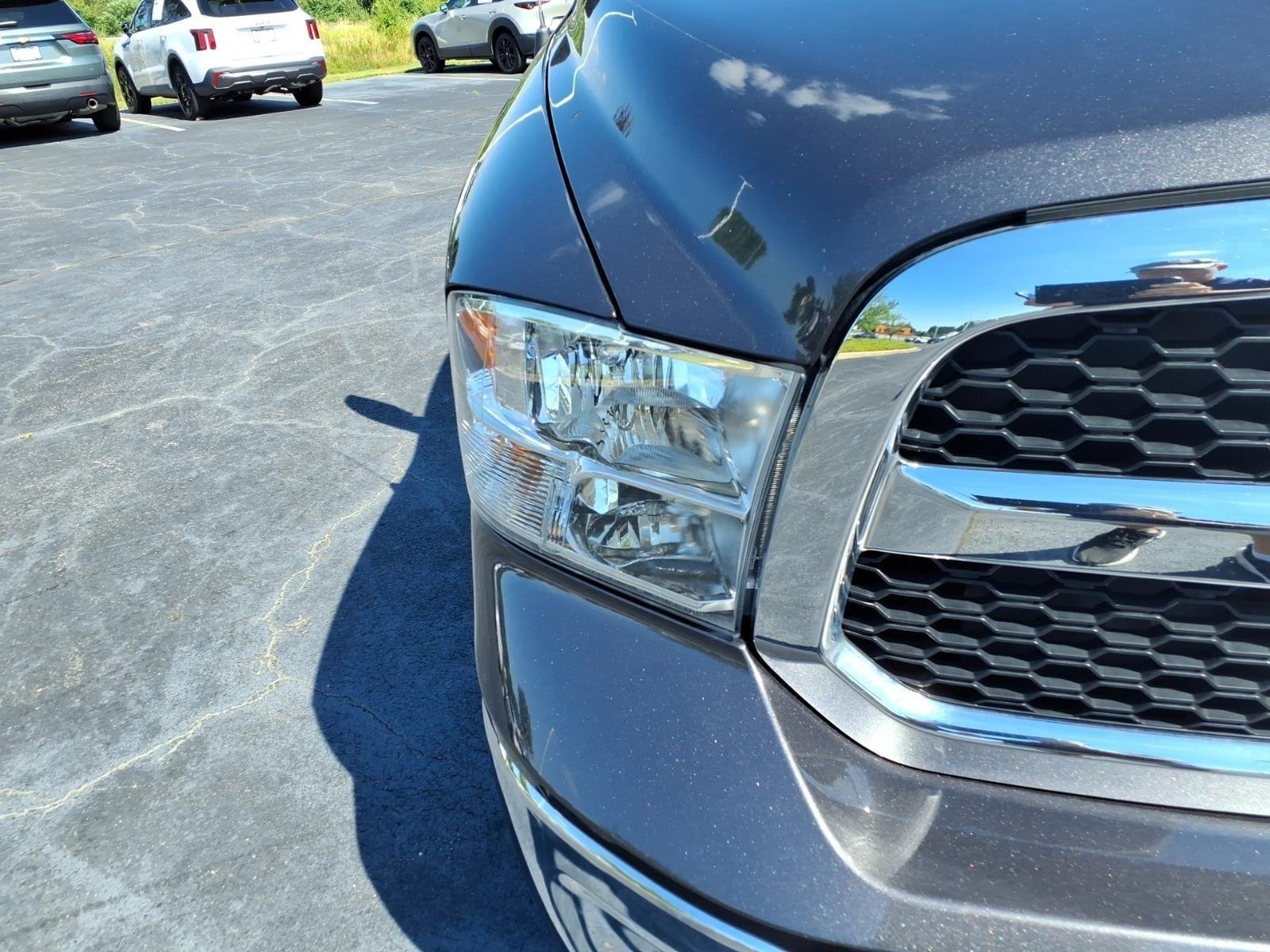 Used 2024 Granite Crystal Metallic Clearcoat Ram SLT image 13