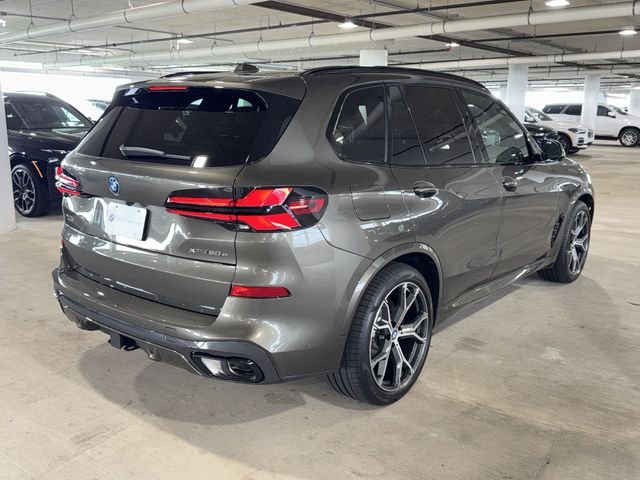 New 2026 Manhattan Green Metallic BMW xDrive50e image 7