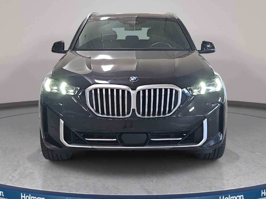 Used 2026 Black Sapphire Metallic BMW sDrive40i image 2