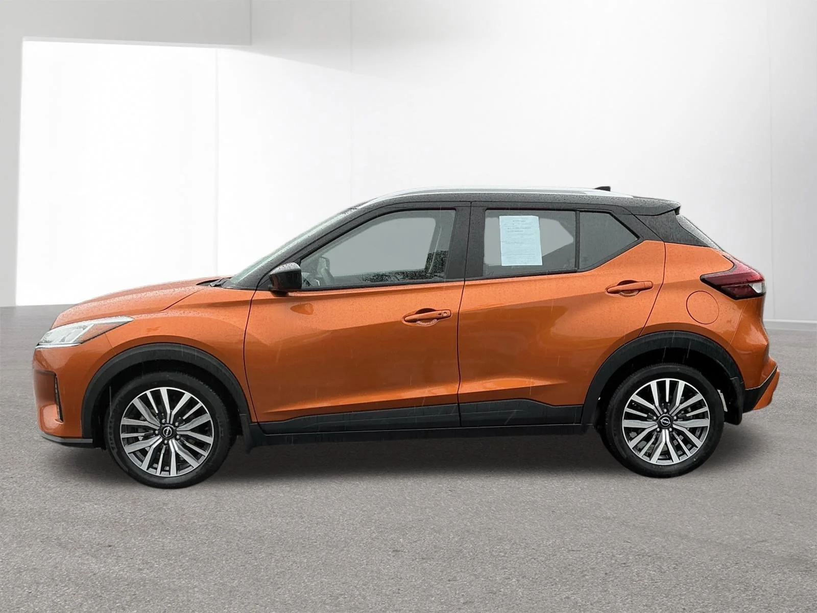Used 2024 Monarch Orange Metallic/Super Black Nissan SV image 6