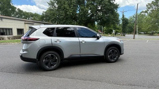 Used 2024 Brilliant Silver Metallic Nissan SV image 16