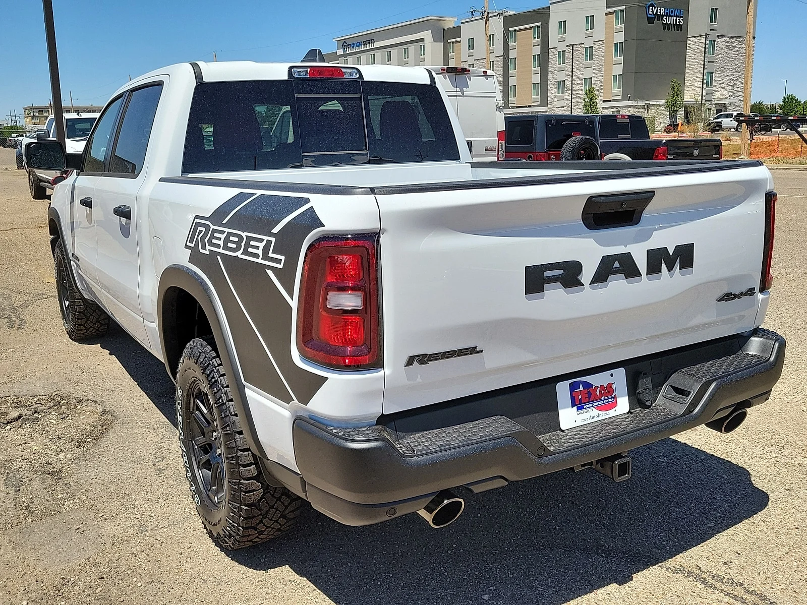 New 2026 PW7 Bright Whit Ram REBEL CREW CAB 4X4 5